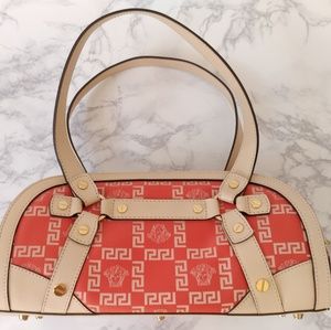 Peach colored Versace Purse
